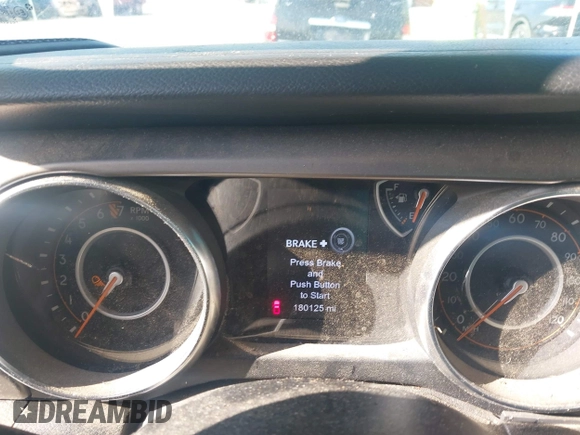 2020 Jeep Gladiator Sport S with VIN 1C6HJTAG0LL216406, listed as a IAAI auction lot 41991629 with 180,125 mi miles and . Bid and sale history available at DreamBid. Image 7.