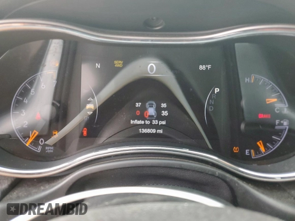 2019 Jeep Grand Cherokee Trailhawk with VIN 1C4RJFLG8KC613582, listed as a Copart auction lot 62901405 with 136,809 mi miles and Salvage title. Bid and sale history available at DreamBid. Image 9.