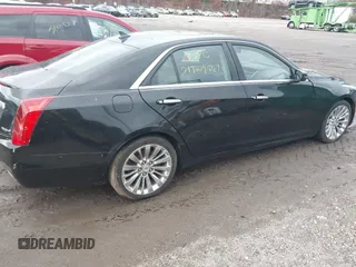 2014 Cadillac CTS Luxury AWD with VIN 1G6AX5SX9E0195923, listed as a IAAI auction lot 40946334 with Not Provided miles and . Bid and sale history available at carsss.com. Image 4.