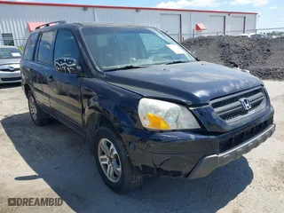 2004 Honda Pilot EX with VIN 2HKYF18524H546430, listed as a IAAI auction lot 42060241 with 126,931 mi miles. Bid and sale history available at carsss.com. Image 6.