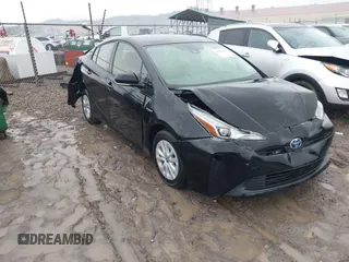 2021 Toyota Prius L Eco with VIN JTDKAMFU5M3145210, listed as a IAAI auction lot 41482234 with 85,600 mi miles. Bid and sale history available at carsss.com. Image 1.