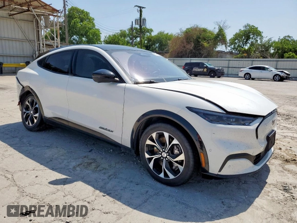2021 Ford Mustang Mach-E Premium with VIN 3FMTK3SU0MMA55958, listed as a Copart auction lot 58714065 with 30,634 mi miles and Salvage title. Bid and sale history available at DreamBid. Image 4.