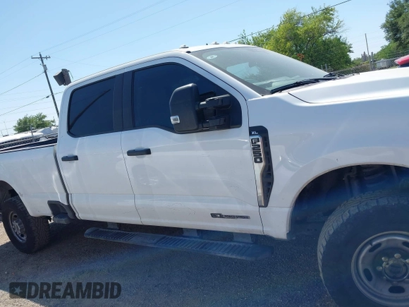 2023 Ford F-250 XL with VIN 1FT7W2BT2PEC30233, listed as a IAAI auction lot 41937400 with 162,574 mi miles and . Bid and sale history available at DreamBid. Image 13.