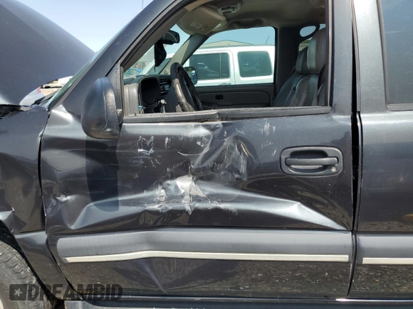 2004 Chevrolet Tahoe LT with VIN 1GNEC13Z74R135885, listed as a Copart auction lot 70202754 with 307,366 mi miles and Salvage Title. Bid and sale history available at carsss.com. Image 7.
