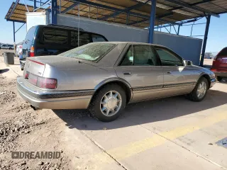 1997 Cadillac Seville Luxury SLS z VIN 1G6KS52Y5VU815770, wystawiony jako Copart lot #88555205 z przebiegiem 92 459 mil mil oraz Czysty tytuł • Clean title. Historia ofert i sprzedaży dostępna na DreamBid. Obrazek 3.