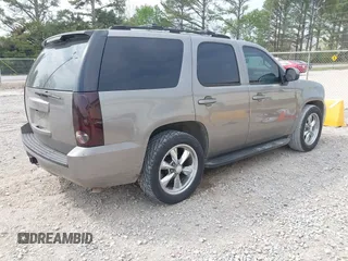 2007 GMC Yukon SLT with VIN 1GKFC13057R126741, listed as a IAAI auction lot 41910018 with 244,921 mi miles. Bid and sale history available at carsss.com. Image 4.