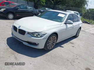 2014 BMW 3 Series 328i with VIN WBA3A5C54EP600398, listed as a IAAI auction lot 42665302 with 117,012 mi miles and . Bid and sale history available at DreamBid. Image 17.