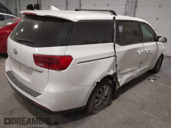 2019 Kia Sedona L with VIN KNDMA5C1XK6524868, listed as a IAAI auction lot 41048602 with 82,511 mi miles. Bid and sale history available at carsss.com. Image 4.