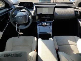 2024 Toyota bZ4X XLE z VIN JTMABACA3RA085576, wystawiony jako Copart lot #64452935 z przebiegiem 8 289 mil mil oraz Czysty tytuł • Clean title. Historia ofert i sprzedaży dostępna na DreamBid. Obrazek 8.