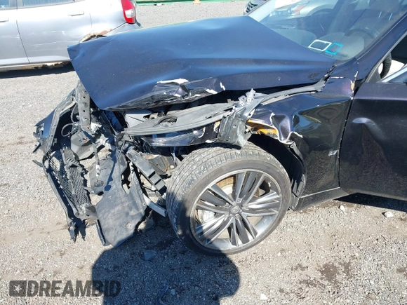2014 Infiniti Q50 Premium with VIN JN1BV7AR0EM689783, listed as a IAAI auction lot 41661020 with 124,762 mi miles. Bid and sale history available at carsss.com. Image 17.