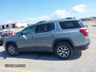 2023 GMC Acadia SLT with VIN 1GKKNML46PZ130813, listed as a IAAI auction lot 42614040 with 56,086 mi miles and . Bid and sale history available at DreamBid. Image 14.