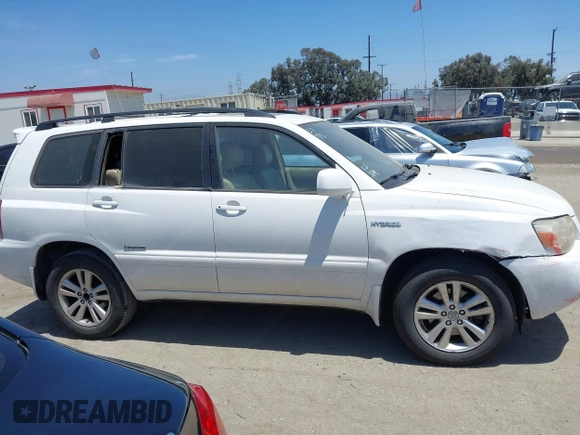 2006 Toyota Highlander z VIN JTEDW21A060015587, wystawiony jako IAAI lot #42239548 z przebiegiem 164 410 mil mil oraz . Historia ofert i sprzedaży dostępna na DreamBid. Obrazek 13.