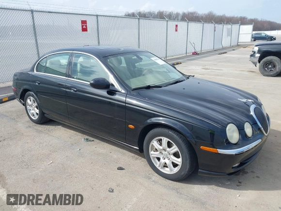 2003 Jaguar S-Type with VIN SAJEA01T93FM64497, listed as a IAAI auction lot 41804705 with 224,978 mi miles and . Bid and sale history available at DreamBid. Image 1.