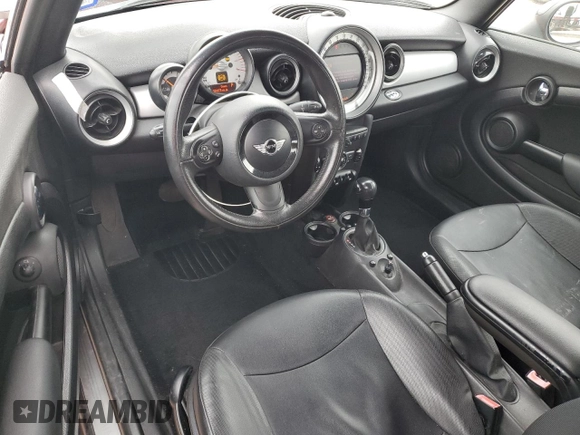 2012 MINI Convertible z VIN WMWZN3C59CT135172, wystawiony jako Copart lot #45593815 z przebiegiem 154 477 mil mil oraz Szkoda całkowita • Salvage title. Historia ofert i sprzedaży dostępna na DreamBid. Obrazek 8.