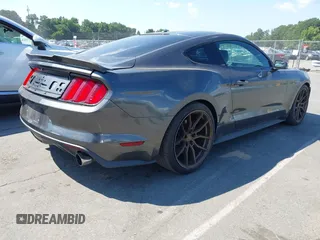 2015 Ford Mustang EcoBoost with VIN 1FA6P8TH8F5394953, listed as a IAAI auction lot 42618352 with 101,302 mi miles and . Bid and sale history available at DreamBid. Image 4.