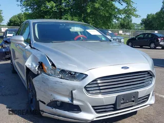 2016 Ford Fusion SE with VIN 3FA6P0T95GR322164, listed as a IAAI auction lot 42553970 with 123,416 mi miles and . Bid and sale history available at DreamBid. Image 1.
