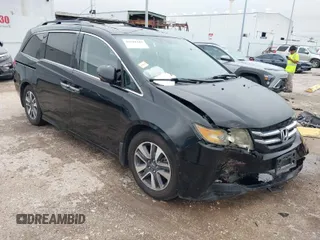 2014 Honda Odyssey Touring with VIN 5FNRL5H99EB075013, listed as a IAAI auction lot 41516323 with 160,076 mi miles and . Bid and sale history available at carsss.com. Image 1.