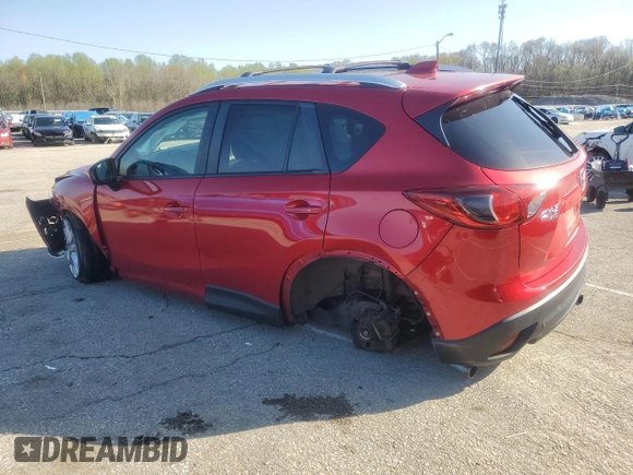 2014 Mazda CX-5 Grand Touring with VIN JM3KE4DY9E0419111, listed as a Copart auction lot 52250315 with 130,003 mi miles and Salvage Title. Bid and sale history available at DreamBid. Image 2.