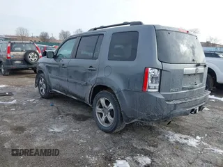 2013 Honda Pilot EX-L with VIN 5FNYF4H65DB001749, listed as a IAAI auction lot 41426636 with 129,912 mi miles and . Bid and sale history available at carsss.com. Image 3.