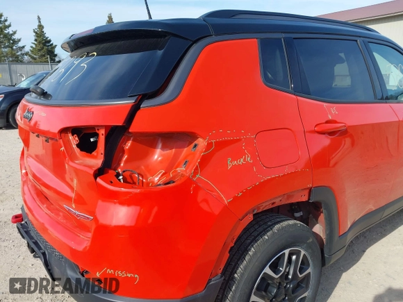 2020 Jeep Compass Trailhawk with VIN 3C4NJDDB2LT142394, listed as a IAAI auction lot 42055893 with 54,490 mi miles and . Bid and sale history available at carsss.com. Image 18.