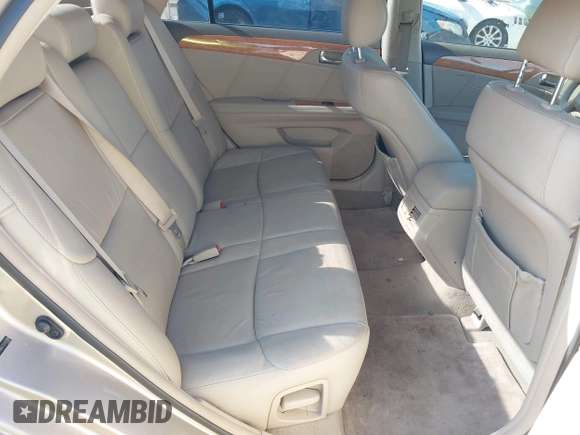 2007 Toyota Avalon XL with VIN 4T1BK36B57U241189, listed as a IAAI auction lot 42130640 with 144,735 mi miles. Bid and sale history available at carsss.com. Image 8.
