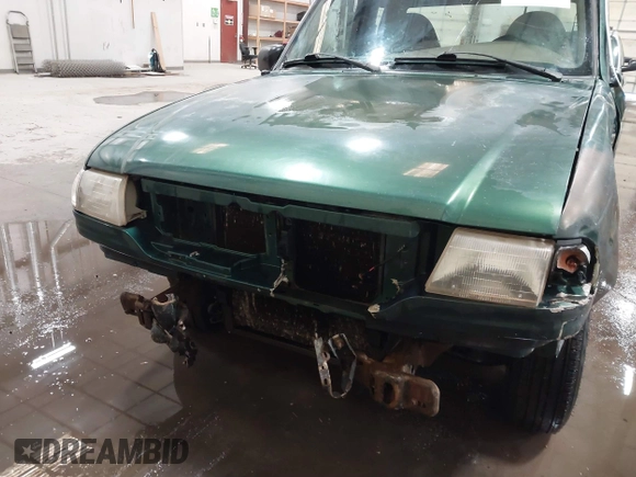 1999 Mazda B-Series Truck SE z VIN 4F4YR16C0XTM43278, wystawiony jako IAAI lot #41687429 z przebiegiem 288 858 mil mil oraz . Historia ofert i sprzedaży dostępna na DreamBid. Obrazek 6.