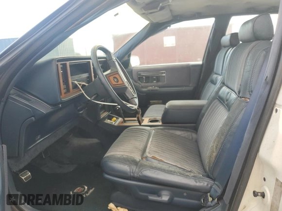 1987 Cadillac Seville z VIN 1G6KS518XHU812739, wystawiony jako Copart lot #79308574 z przebiegiem Nie podano mil oraz Szkoda całkowita • Salvage title. Historia ofert i sprzedaży dostępna na DreamBid. Obrazek 7.
