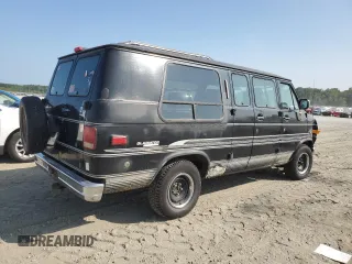 1994 Chevrolet Chevy Van z VIN 1GBEG25K3RF178166, wystawiony jako Copart lot #69173594 z przebiegiem 143 577 mil mil oraz Szkody całkowita. Historia ofert i sprzedaży dostępna na DreamBid. Obrazek 3.