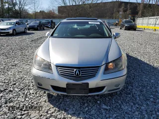 2005 Acura RL z VIN JH4KB165X5C014519, wystawiony jako Copart lot #63648925 z przebiegiem 215 443 mil mil oraz Nie do naprawy • Non repairable. Historia ofert i sprzedaży dostępna na DreamBid. Obrazek 5.