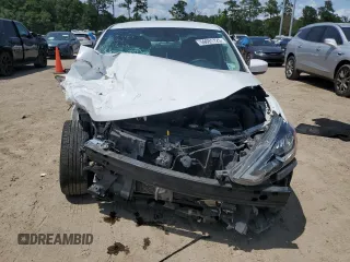 2019 Nissan Sentra S z VIN 3N1AB7AP9KY329164, wystawiony jako Copart lot #59691725 z przebiegiem 158 068 mil mil oraz Szkoda całkowita • Salvage title. Historia ofert i sprzedaży dostępna na DreamBid. Obrazek 5.