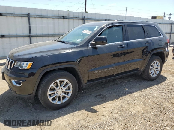 2021 Jeep Grand Cherokee Laredo E with VIN 1C4RJFAG8MC817661, listed as a Copart auction lot 52374235 with 25,305 mi miles and Salvage title. Bid and sale history available at DreamBid. Image 1.