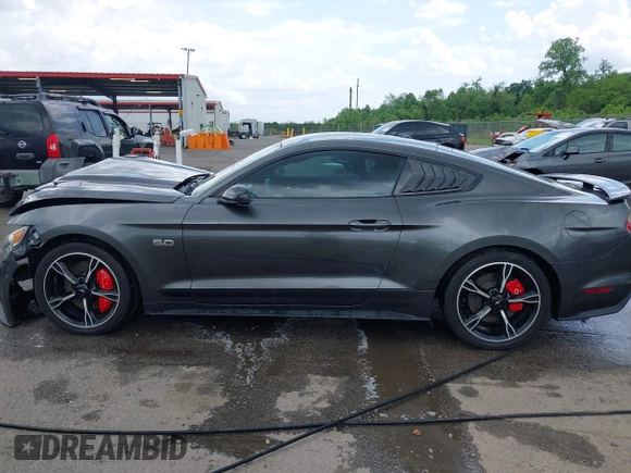2016 Ford Mustang GT z VIN 1FA6P8CF4G5264863, wystawiony jako IAAI lot #42078115 z przebiegiem 95 889 mil mil oraz . Historia ofert i sprzedaży dostępna na DreamBid. Obrazek 14.
