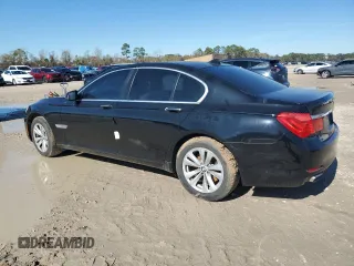2012 BMW 7 Series 740i with VIN WBAKA4C52CDS99036, listed as a Copart auction lot 88492615 with Not provided miles and Salvage title. Bid and sale history available at DreamBid. Image 2.