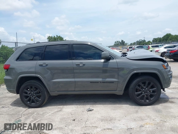 2019 Jeep Grand Cherokee Upland with VIN 1C4RJFAG9KC674720, listed as a IAAI auction lot 40002864 with Not Provided miles and . Bid and sale history available at DreamBid. Image 13.