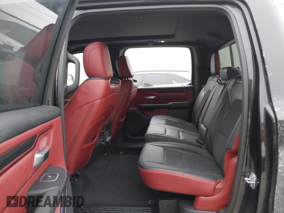2019 Ram 1500 Rebel z VIN 1C6SRFLT6KN599362, wystawiony jako IAAI lot #41560018 z przebiegiem Nie podano mil oraz . Historia ofert i sprzedaży dostępna na DreamBid. Obrazek 8.