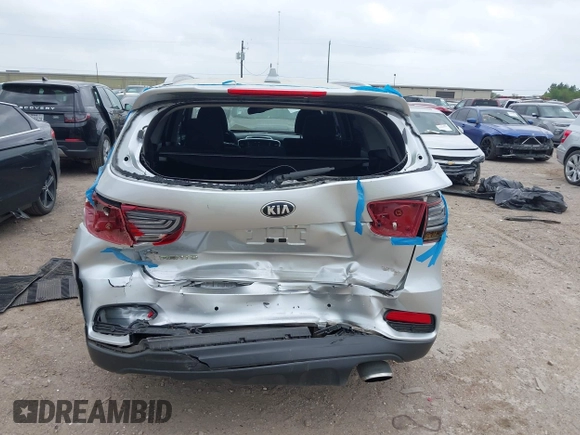 2019 Kia Sorento LX z VIN 5XYPG4A5XKG447654, wystawiony jako IAAI lot #41943667 z przebiegiem 84 241 mil mil oraz . Historia ofert i sprzedaży dostępna na DreamBid. Obrazek 16.