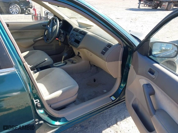 2001 Honda Civic LX with VIN 2HGES16551H567764, listed as a IAAI auction lot 41908288 with 137,740 mi miles. Bid and sale history available at carsss.com. Image 5.
