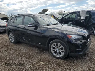 2013 BMW X1 xDrive28i z VIN WBAVL1C58DVR82070, wystawiony jako Copart lot #55740795 z przebiegiem 136 394 mil mil oraz Nie do naprawy • Non repairable. Historia ofert i sprzedaży dostępna na DreamBid. Obrazek 4.