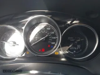 2014 Mazda CX-5 Grand Touring with VIN JM3KE2DY1E0380423, listed as a IAAI auction lot 41854206 with 129,763 mi miles. Bid and sale history available at carsss.com. Image 7.