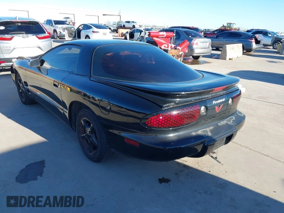 2002 Pontiac Firebird Firebird z VIN 2G2FS22K022109417, wystawiony jako IAAI lot #41199057 z przebiegiem 124 463 mil mil oraz . Historia ofert i sprzedaży dostępna na DreamBid. Obrazek 3.