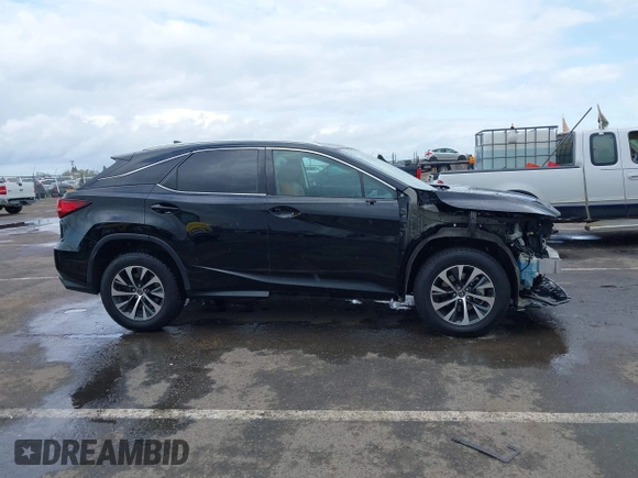 2021 Lexus RX with VIN 2T2HZMDA0MC274146, listed as a IAAI auction lot 41925284 with 67,064 mi miles. Bid and sale history available at carsss.com. Image 14.