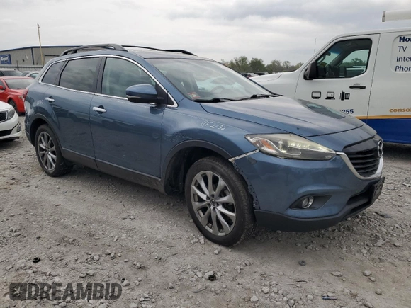 2015 Mazda CX-9 Grand Touring z VIN JM3TB2DAXF0448042, wystawiony jako Copart lot #53620085 z przebiegiem 134 386 mil mil oraz Szkoda całkowita • Salvage title. Historia ofert i sprzedaży dostępna na DreamBid. Obrazek 4.