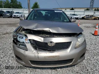2010 Toyota Corolla with VIN 2T1BU4EE1AC496779, listed as a Copart auction lot 62854035 with 158,502 mi miles and Salvage title. Bid and sale history available at DreamBid. Image 5.