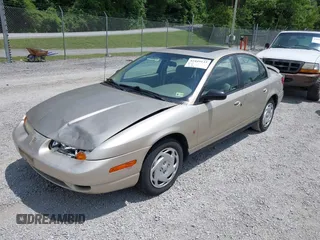 2001 Saturn SL z VIN 1G8ZK54721Z272773, wystawiony jako IAAI lot #42449133 z przebiegiem 56 714 mil mil oraz . Historia ofert i sprzedaży dostępna na DreamBid. Obrazek 2.