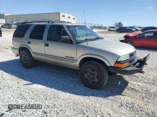 2004 Chevrolet Blazer LS z VIN 1GNDT13X54K166622, wystawiony jako Copart lot #50248605 z przebiegiem 198 301 mil mil oraz Szkoda całkowita • Salvage title. Historia ofert i sprzedaży dostępna na DreamBid. Obrazek 4.