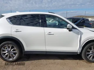 2019 Mazda CX-5 Grand Touring with VIN JM3KFBDM8K0518576, listed as a IAAI auction lot 41854296 with 88,706 mi miles and . Bid and sale history available at carsss.com. Image 13.