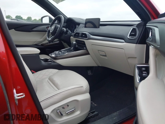 2021 Mazda CX-9 Signature with VIN JM3TCBEY9M0511928, listed as a IAAI auction lot 42231925 with 26,367 mi miles and . Bid and sale history available at DreamBid. Image 5.