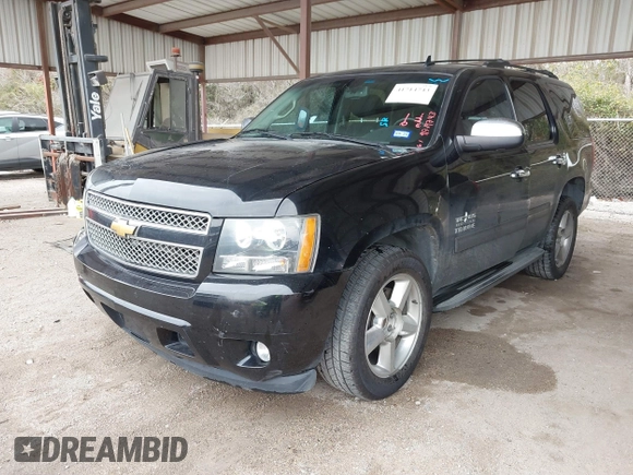 2013 Chevrolet Tahoe LS with VIN 1GNSCAE01DR121580, listed as a IAAI auction lot 41714743 with 257,616 mi miles and . Bid and sale history available at DreamBid. Image 2.
