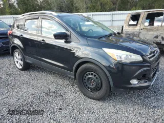 2013 Ford Escape Titanium z VIN 1FMCU0J95DUD15496, wystawiony jako Copart lot #45845915 z przebiegiem 157 078 mil mil oraz Szkody całkowita. Historia ofert i sprzedaży dostępna na DreamBid. Obrazek 4.