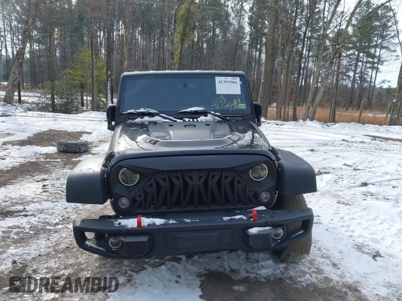 2017 Jeep Wrangler Unlimited Rubicon Recon z VIN 1C4BJWFG4HL723096, wystawiony jako IAAI lot #41393584 z przebiegiem 102 045 mil mil oraz . Historia ofert i sprzedaży dostępna na DreamBid. Obrazek 13.